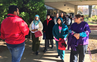 Southwest Ambassador Josue Flores guides prospective students and their families on a Macon Cove Campus tour for Campus Day. .