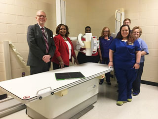 Pictured inside one of the new radiology labs are: Allied Health Sciences Chair Osborne Burks, President Tracy D. Hall, program coordinator Tracy Freeman Jones, clinic coordinator Delores Thomas-Boland, senior students Carrie Ross and Colin Mattix, and instructor Emily Stinson. 