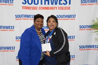 Vice President for Student Affairs Jacqueline Faulkner presents the Student Service and Enrollment Management Award to Mary Molder.