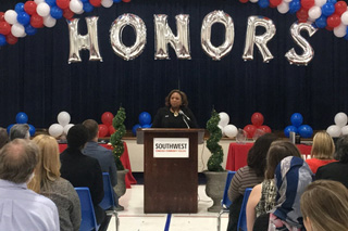 President Tracy D. Hall addresses a packed Nabors Auditorium at the 2019 Student Honors and Awards Convocation 