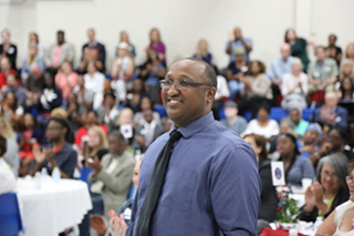 Sara Tinker and Phillip Johnson read their special “I Am” poem at convocation.