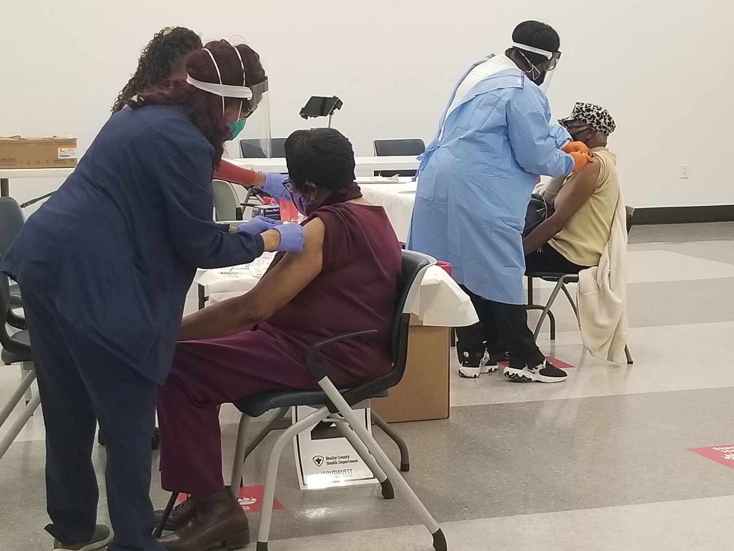 Shelby County Health Department vaccinators at the Whitehaven Center Vaccination Site administer the Pfizer COVID-19 vaccine to retired nurses.