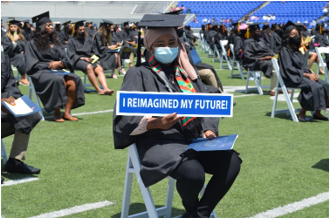 Class of 2021 graduates beam at the College’s first-ever outdoor commencement