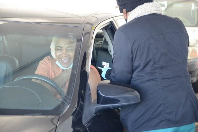 A Shelby County resident receives the Pfizer vaccine reopening day of the Whitehaven Vaccination site Jan. 28. 