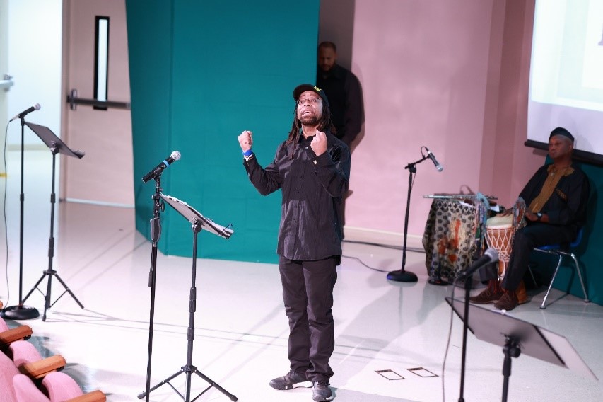 Benjamin Theolonius Sanders, founder of H.O.P.E. (Hands-On Poetry Experience), gave a passionate spoken word performance during the Juneteenth Celebration.  