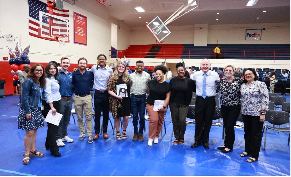 Award recipients pose with Southwest faculty during the 2024 Honors and Awards Convocation at the Verties Sails Gymnasium. 