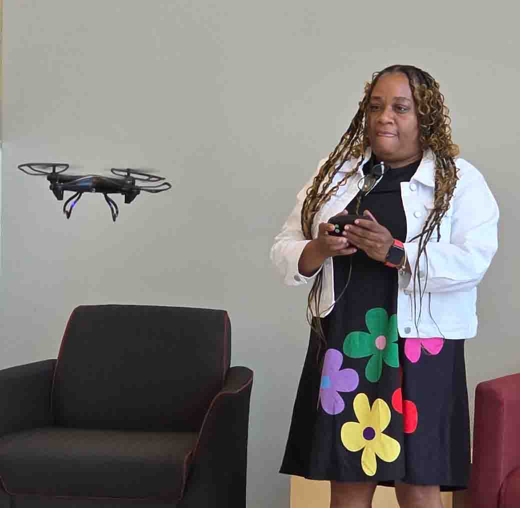 Woman flying drone
