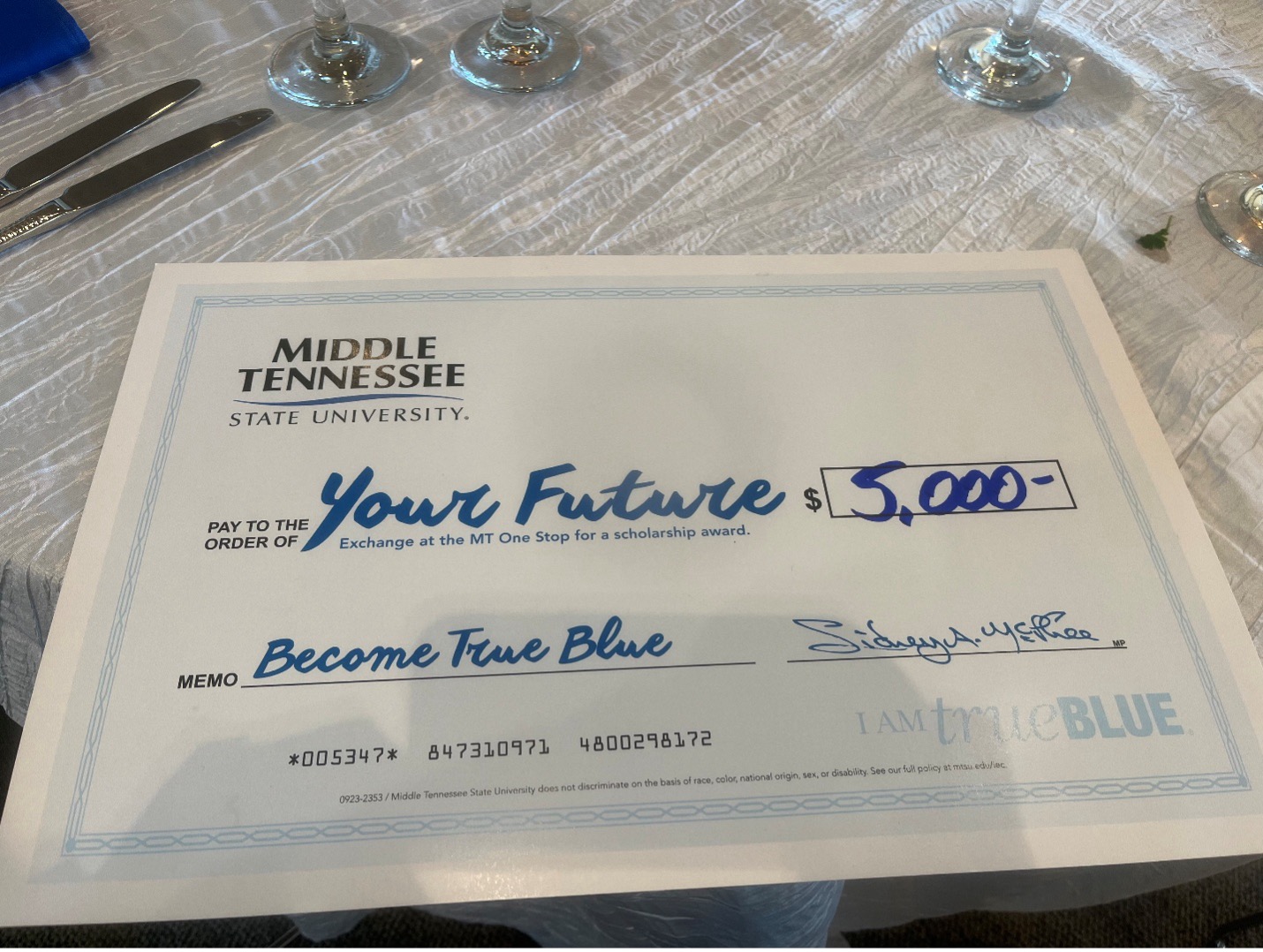 Middle Tennessee State check that says pay to the order of your future for 5000
